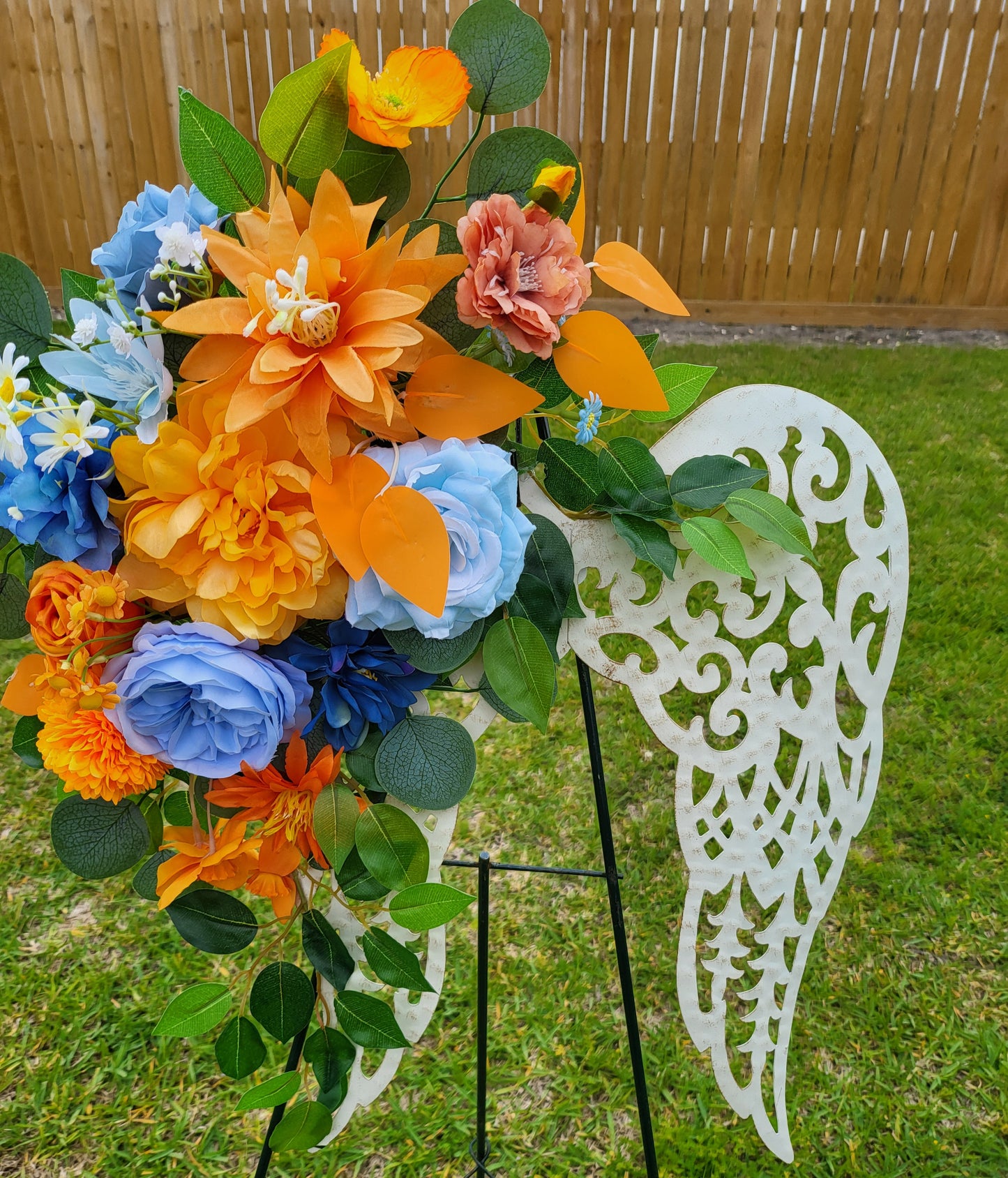 Angel Wings with Orange and Blue Silk Flowers